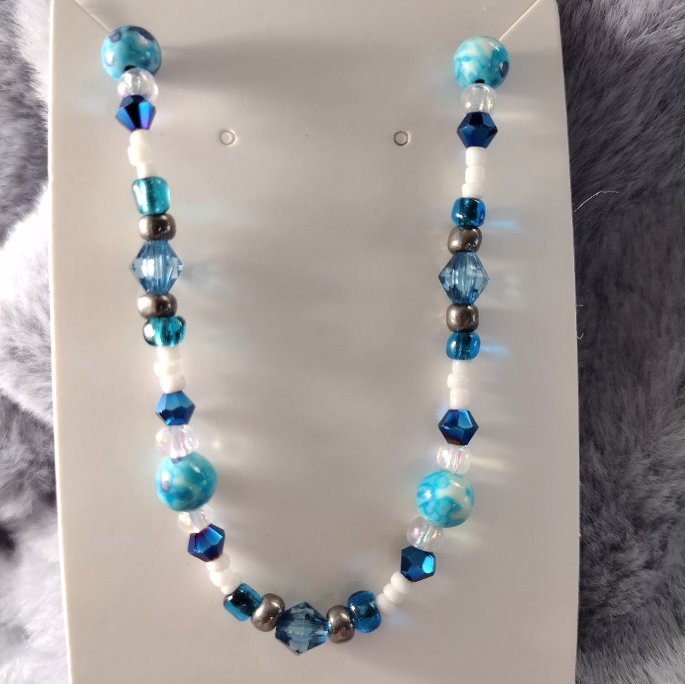 Elastic beaded bracelet, handmade, 7.5 inches, blue silver white, marbled beads